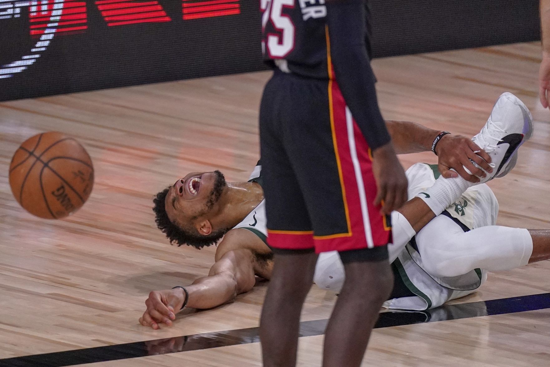 Giannis Antetokounmpo ankle injury Game 4, AP photo